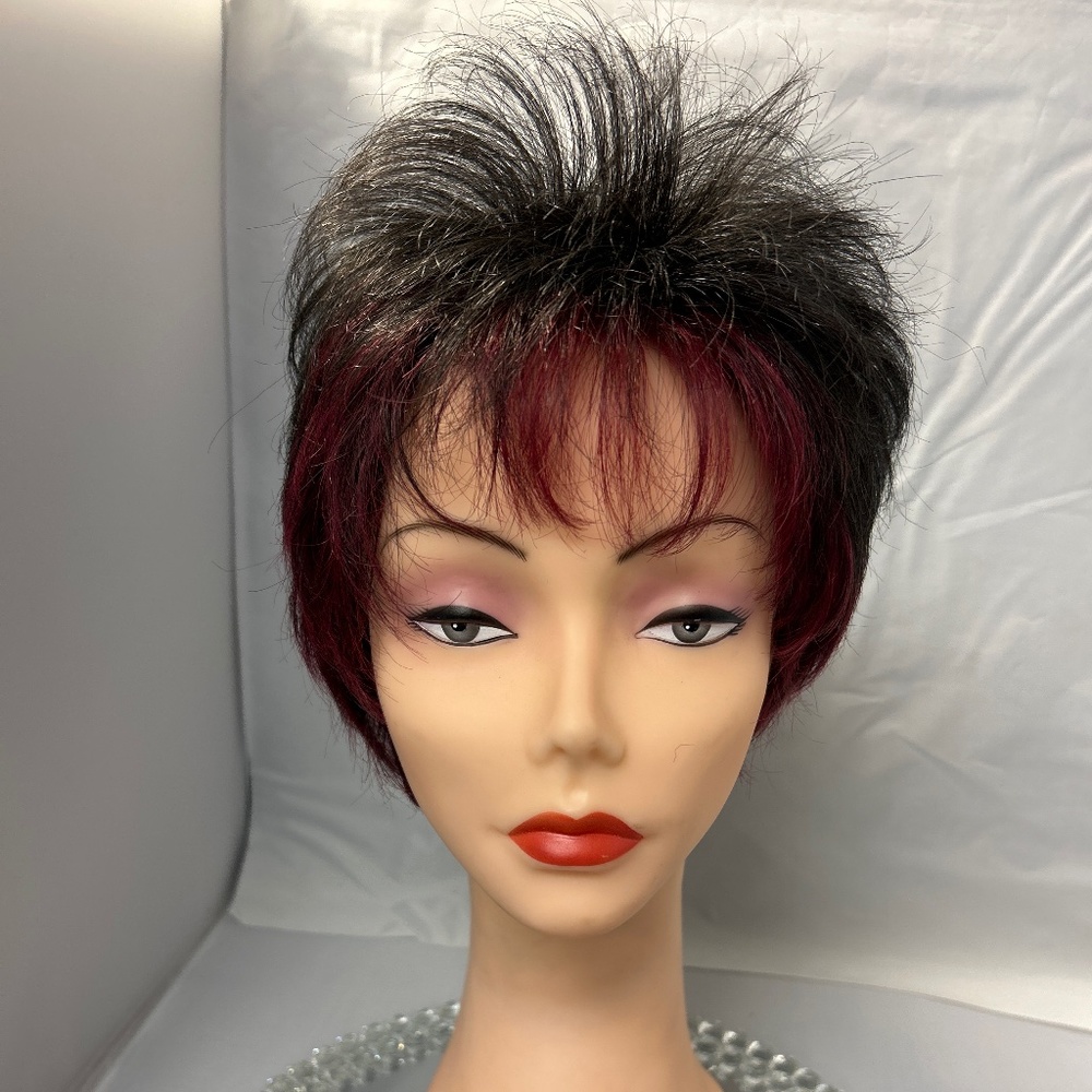 Black wig with ruby red face framing highlights
